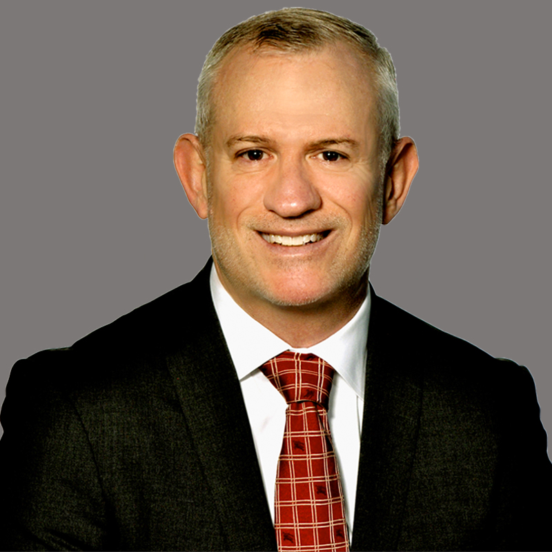 A headshot of Aaron Marchildon