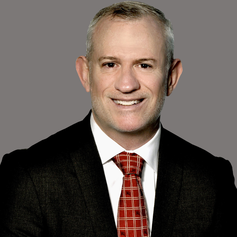 A headshot of Aaron Marchildon