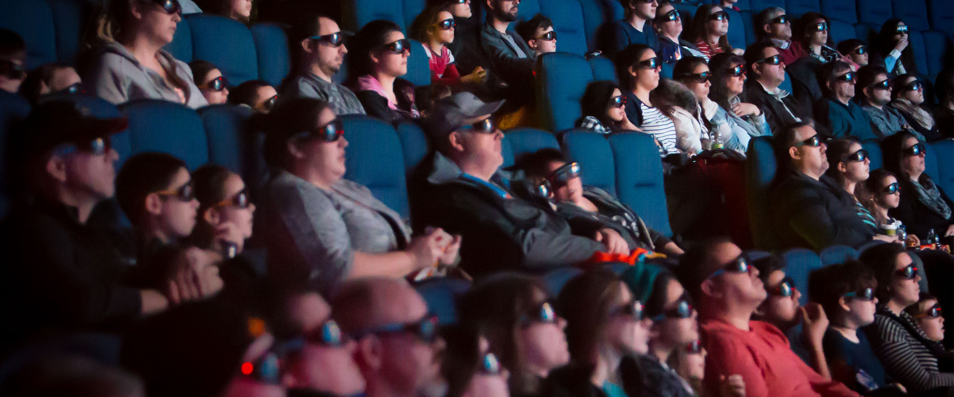 Moviegoers at the IMAX®TELUS Theatre