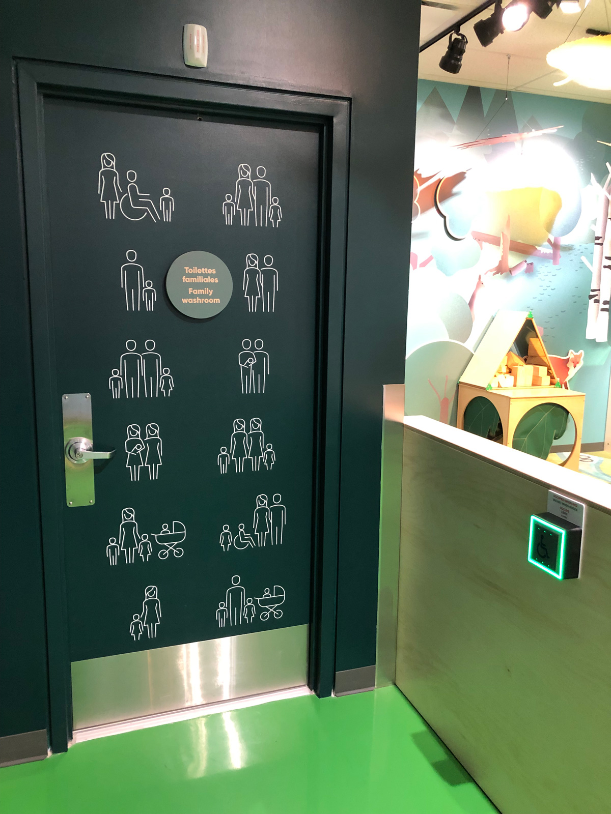 The door to an accessible and gender neutral washroom inside the Mini Mondo exhibition