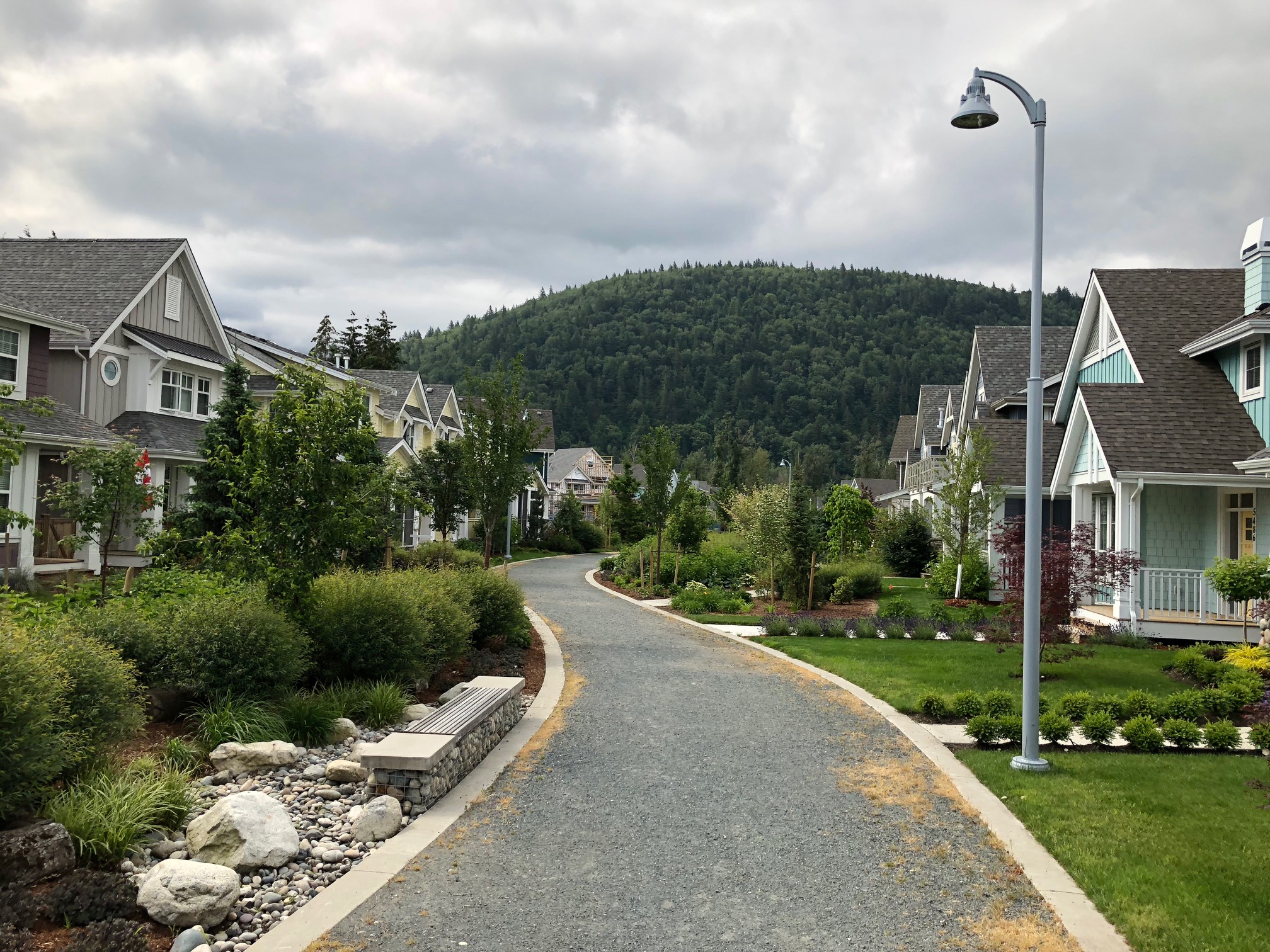 River's Edge showing homes on both sides of a pathway