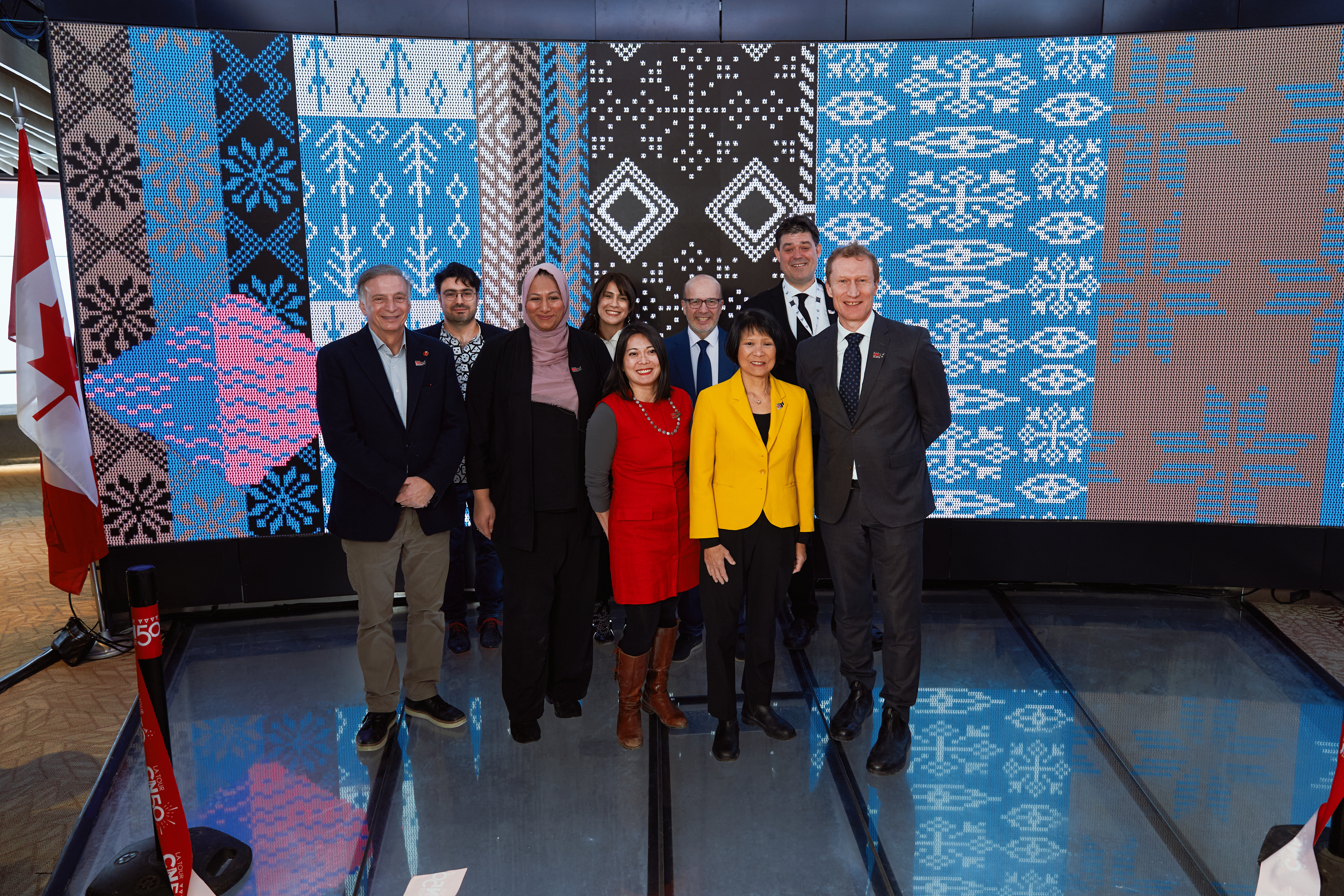 Image showing people standing together for a ribbon cutting event