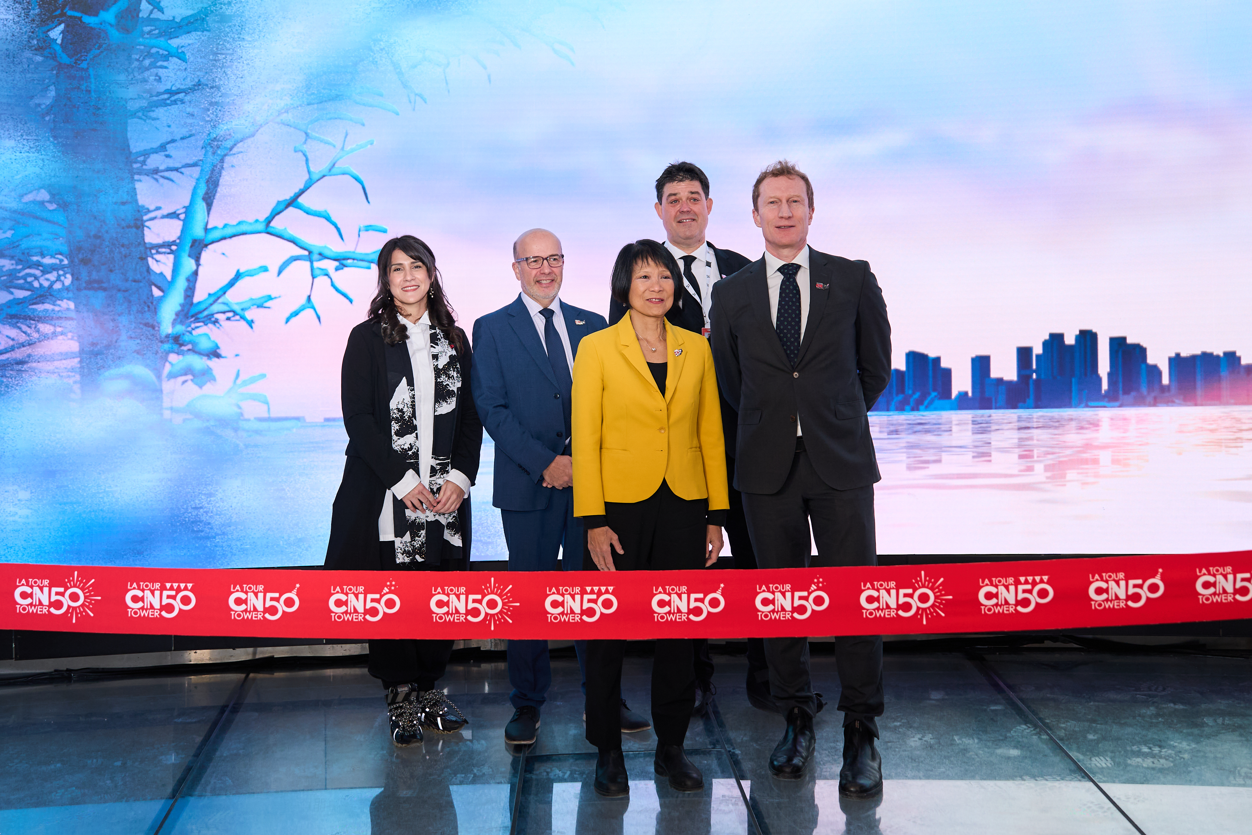 Image showing people standing together for a ribbon cutting event