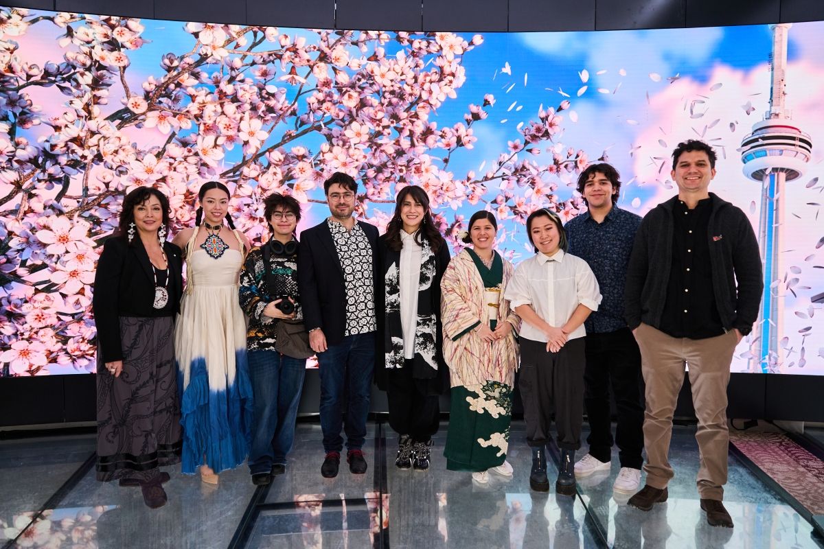 Image showing people standing together for a ribbon cutting event