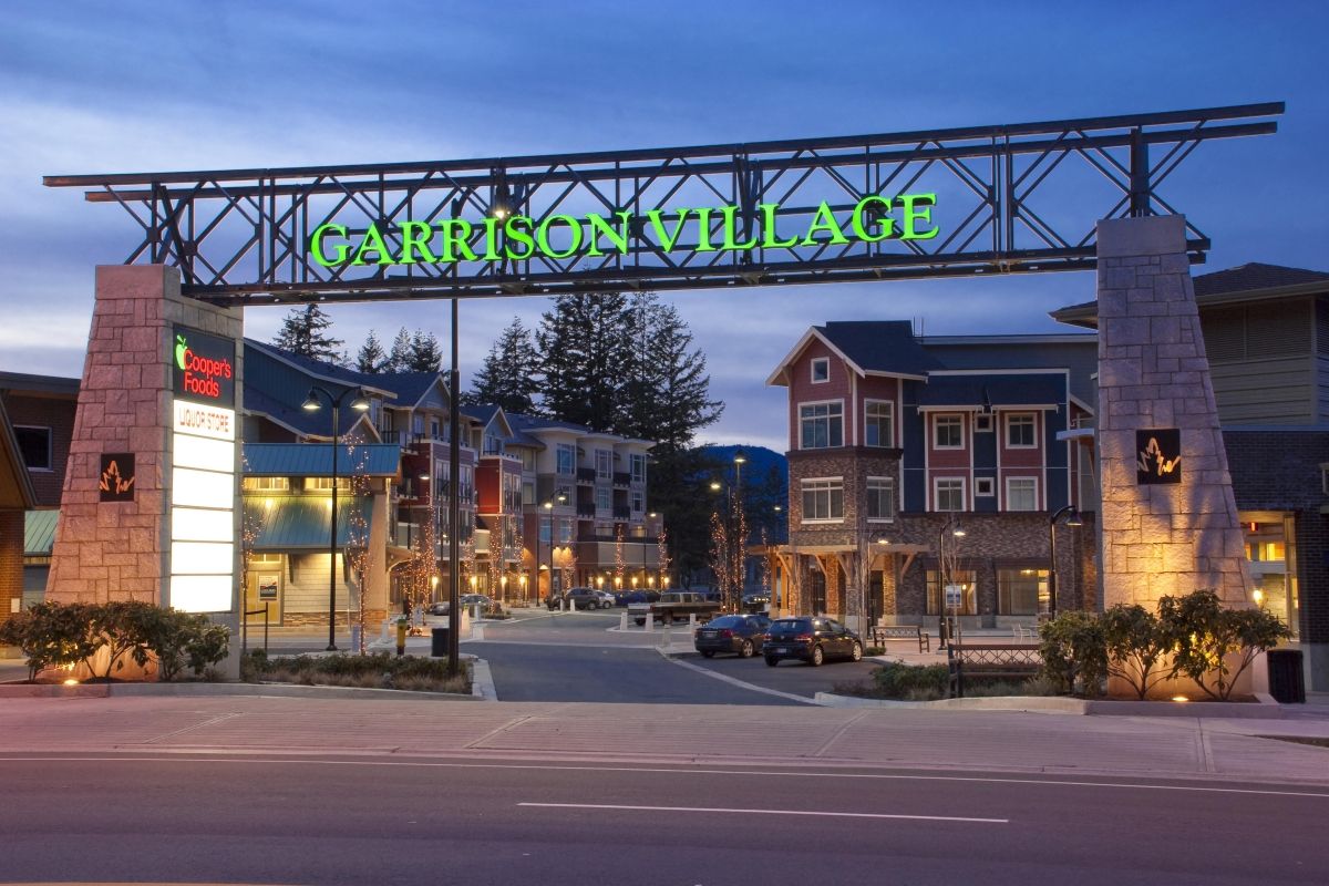 Garrison Crossing entrance with sign showing name