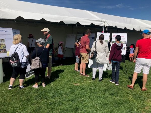 A group of people outdoors at a community event